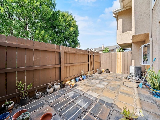 1465 E Lexington Ave Unit 11C, El Cajon, CA 92019 - fenced backyard with central AC and a patio area