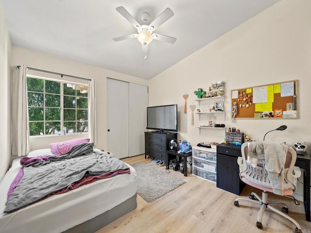 1465 E Lexington Ave Unit 11C, El Cajon, CA 92019 - bedroom with light wood-type flooring, a closet, lofted ceiling, and a ceiling fan