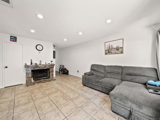 1465 E Lexington Ave Unit 11C, El Cajon, CA 92019 - living area with recessed lighting, light tile patterned floors, a fireplace, and baseboards