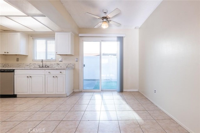 8804 Valley View St Unit C, Buena Park, CA 90620 - kitchen with dishwasher, a ceiling fan, white cabinets, and baseboards