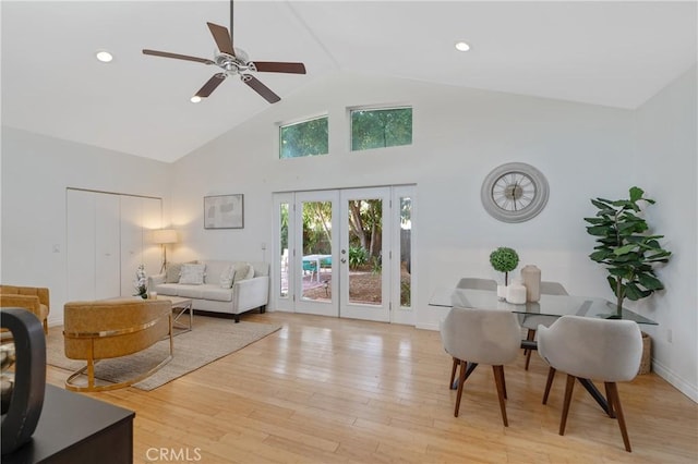 8521 Ranchito Ave, Panorama City, CA 91402 - living room with french doors, light wood finished floors, a ceiling fan, high vaulted ceiling, and recessed lighting