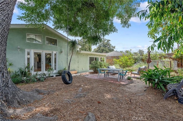 8521 Ranchito Ave, Panorama City, CA 91402 - view of yard with french doors and a patio