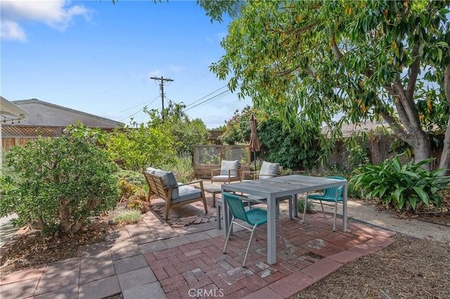 8521 Ranchito Ave, Panorama City, CA 91402 - fenced backyard featuring a patio area and outdoor dining area