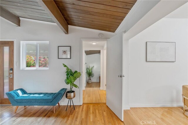 8521 Ranchito Ave, Panorama City, CA 91402 - sitting room with wooden ceiling, wood finished floors, and baseboards