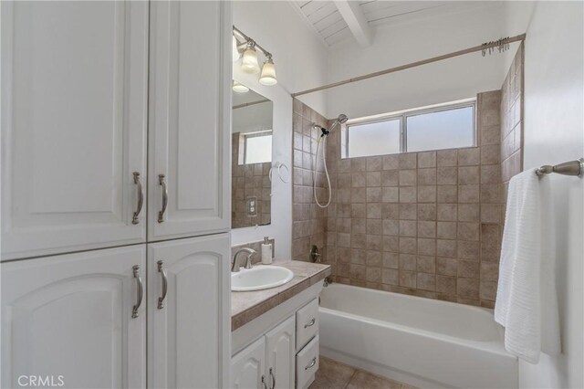 8521 Ranchito Ave, Panorama City, CA 91402 - full bathroom featuring shower / bath combination, vanity, beamed ceiling, and tile patterned flooring