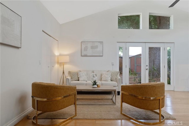 8521 Ranchito Ave, Panorama City, CA 91402 - living area with plenty of natural light, high vaulted ceiling, wood finished floors, and french doors