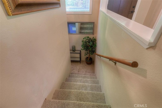 6125 Desabla Ln, Magalia, CA 95954 - stairs featuring a textured wall and carpet floors