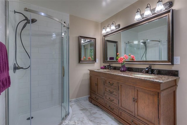 6125 Desabla Ln, Magalia, CA 95954 - bathroom featuring marble finish flooring, a stall shower, and double vanity