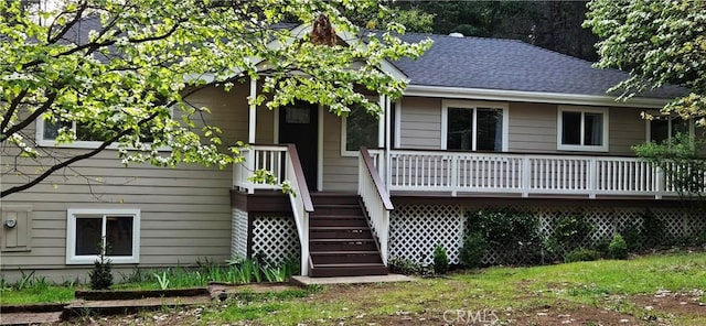 6125 Desabla Ln, Magalia, CA 95954 - rear view of house with a wooden deck, stairs, and a shingled roof