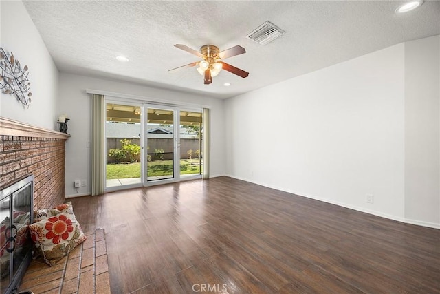 1418 E Wilshire Ave, Fullerton, CA 92831 - living area with a fireplace, ceiling fan, a textured ceiling, wood finished floors, and recessed lighting