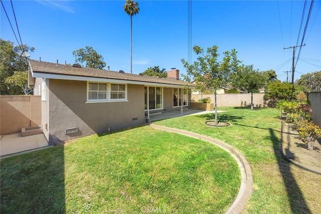 1418 E Wilshire Ave, Fullerton, CA 92831 - back of house with stucco siding, a chimney, crawl space, and a patio area