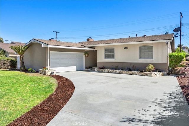 1418 E Wilshire Ave, Fullerton, CA 92831 - ranch-style house with concrete driveway, a garage, a front lawn, and a chimney