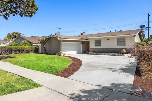 1418 E Wilshire Ave, Fullerton, CA 92831 - ranch-style home with an attached garage, a front lawn, driveway, and a chimney
