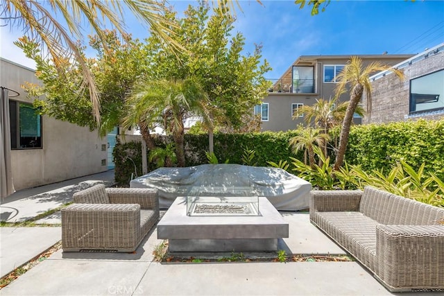 151 Cedar Way, Laguna Beach, CA 92651 - view of patio / terrace with an outdoor living space with a fire pit