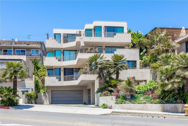150 Cliff Dr, Laguna Beach, CA 92651 - view of property featuring a garage and driveway