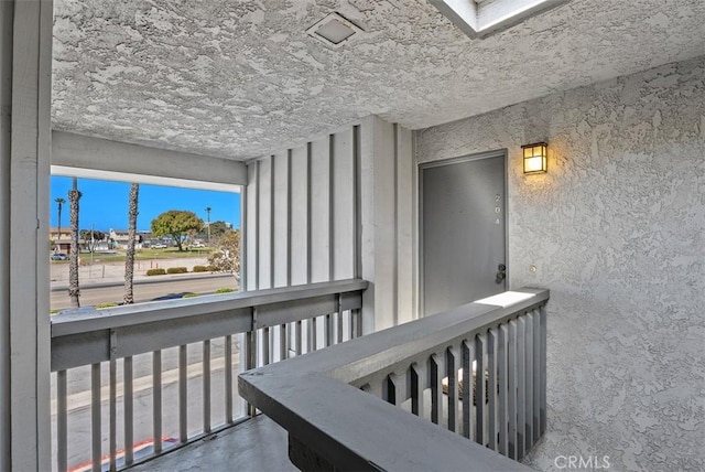 17152 Pacific Coast Unit 19, Huntington Beach, CA 92649 - hall featuring concrete flooring