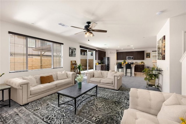 4337 Rima Dr, Fontana, CA 92336 - living area with a ceiling fan, recessed lighting, and light carpet