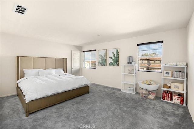 4337 Rima Dr, Fontana, CA 92336 - carpeted bedroom featuring multiple windows