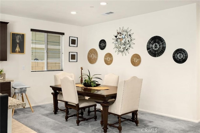 4337 Rima Dr, Fontana, CA 92336 - dining space featuring light colored carpet, baseboards, and recessed lighting
