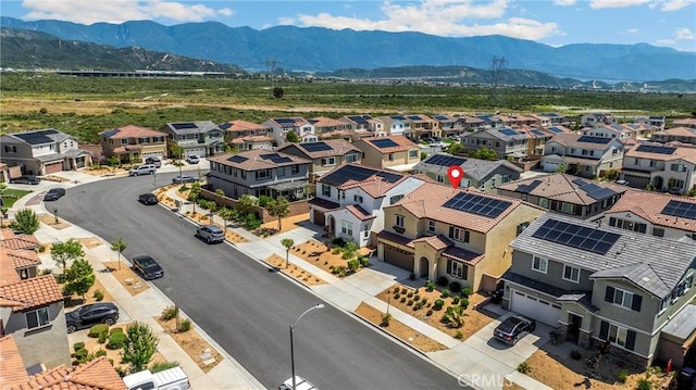 4337 Rima Dr, Fontana, CA 92336 - aerial perspective of suburban area with a mountain backdrop