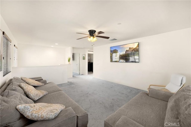 4337 Rima Dr, Fontana, CA 92336 - living area featuring light carpet and a ceiling fan