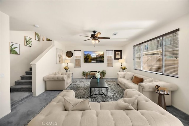 4337 Rima Dr, Fontana, CA 92336 - carpeted living room with stairs and ceiling fan