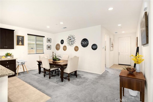 4337 Rima Dr, Fontana, CA 92336 - dining space featuring recessed lighting, light colored carpet, and baseboards