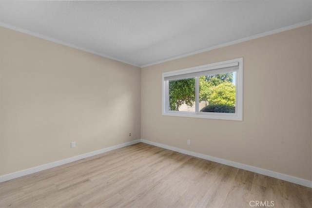 19924 Mildred Ave, Torrance, CA 90503 - empty room featuring light wood-style floors, baseboards, and crown molding