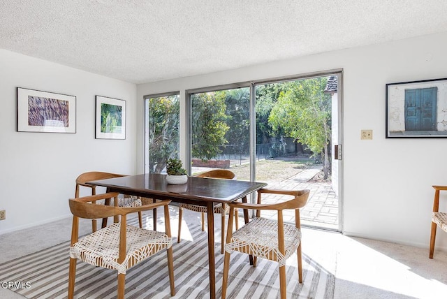 1875 Rose Ave, San Marino, CA 91108 - carpeted dining area with a textured ceiling and baseboards