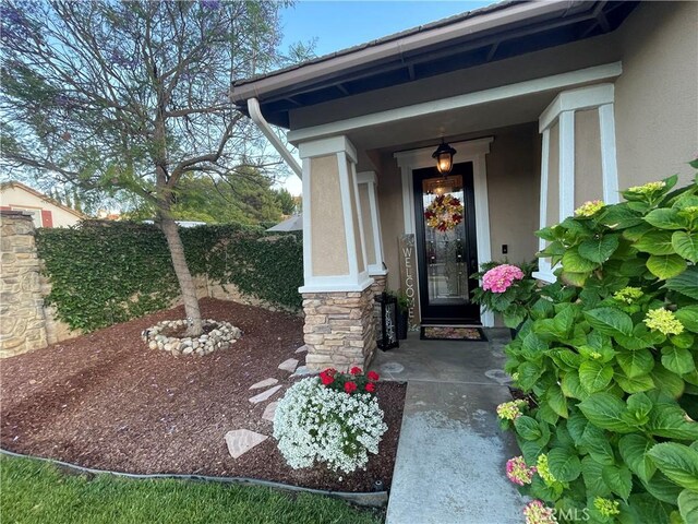 27665 Bottle Brush Way, Murrieta, CA 92562 - view of exterior entry with stucco siding and stone siding