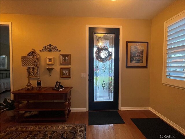 27665 Bottle Brush Way, Murrieta, CA 92562 - entrance foyer with wood finished floors and baseboards