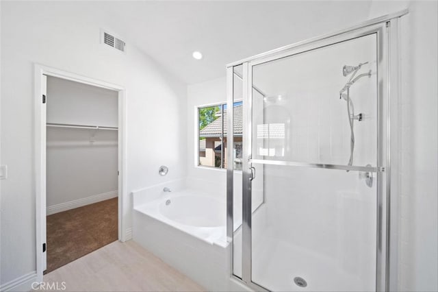 44779 Corte Sanchez, Temecula, CA 92592 - bathroom featuring a shower stall, a garden tub, a walk in closet, recessed lighting, and baseboards