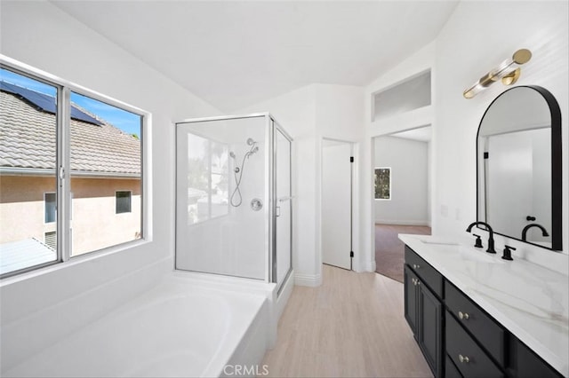 44779 Corte Sanchez, Temecula, CA 92592 - full bath featuring a stall shower, wood finished floors, vanity, and a garden tub