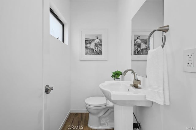 41361/2 Normal Ave Unit 1/2, Los Angeles, CA 90029 - bathroom with toilet, wood finished floors, and baseboards