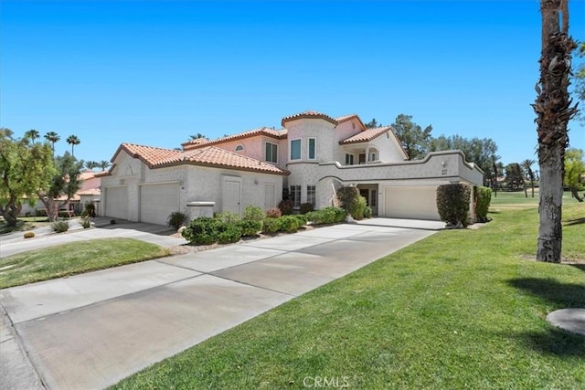 491 Desert Falls Dr N, Palm Desert, CA 92211 - mediterranean / spanish house with concrete driveway, an attached garage, stucco siding, and a tile roof