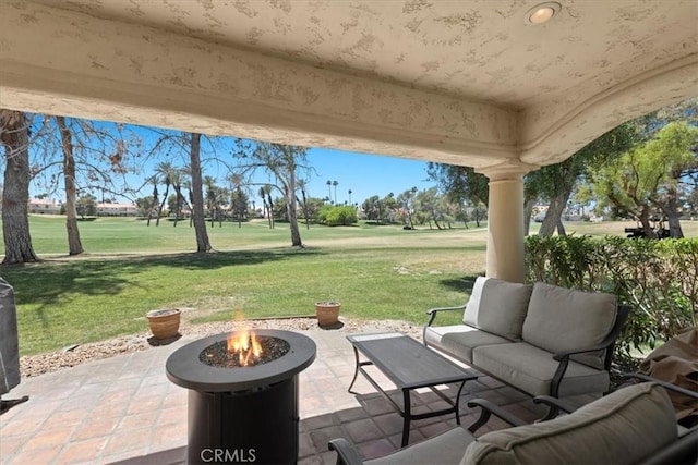 491 Desert Falls Dr N, Palm Desert, CA 92211 - view of patio with an outdoor living space with a fire pit and view of golf course