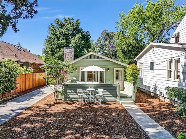 319 W 6th St, Claremont, CA 91711 - bungalow-style home featuring a chimney
