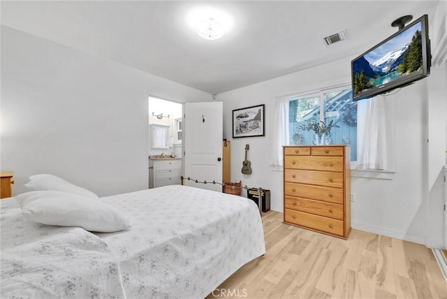 319 W 6th St, Claremont, CA 91711 - bedroom with light wood-style flooring and ensuite bathroom