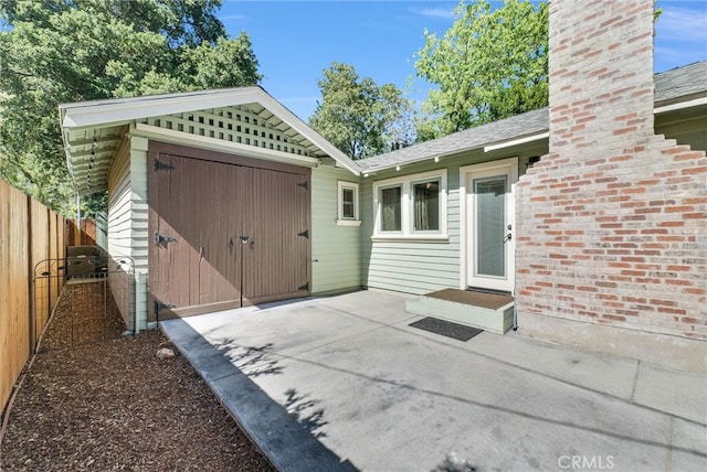 319 W 6th St, Claremont, CA 91711 - view of patio / terrace with an attached garage