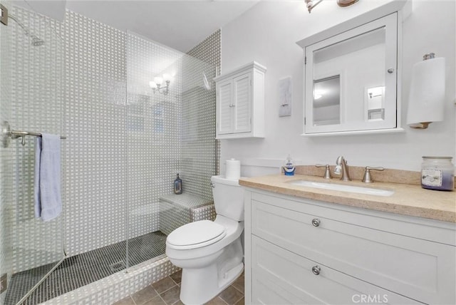 319 W 6th St, Claremont, CA 91711 - full bathroom featuring toilet, a shower stall, vanity, and tile patterned floors