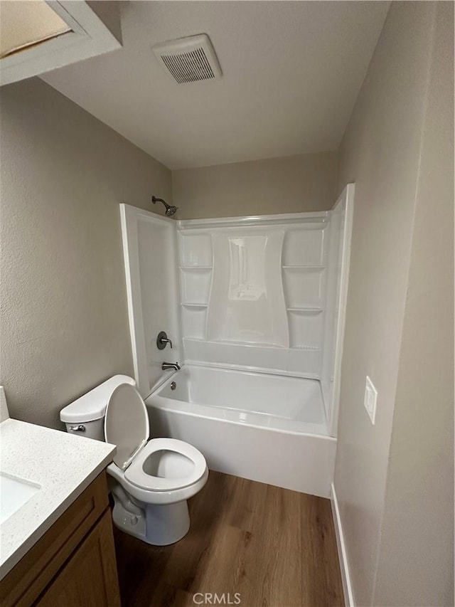 2394 Gonzaga Ln, Riverside, CA 92507 - full bathroom featuring wood finished floors, vanity, and shower / bath combination