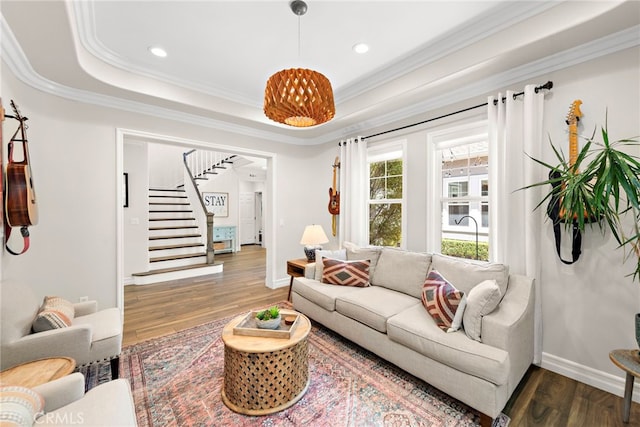 11 Markham Ln, Ladera Ranch, CA 92694 - living area with crown molding, stairway, wood finished floors, recessed lighting, and a raised ceiling