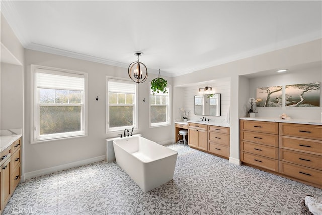 11 Markham Ln, Ladera Ranch, CA 92694 - full bathroom featuring crown molding, a freestanding bath, baseboards, a chandelier, and vanity