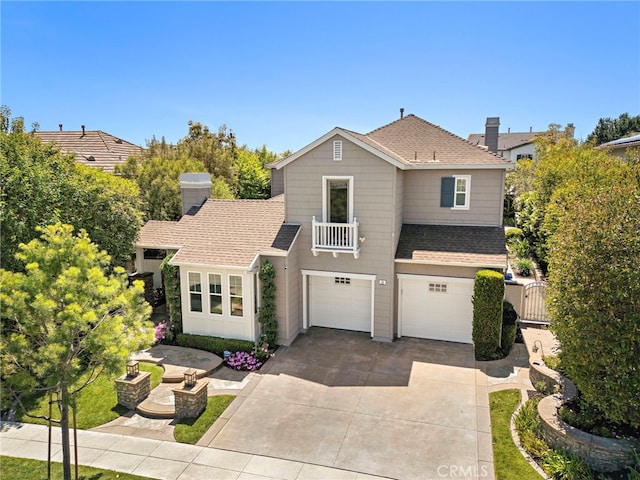 11 Markham Ln, Ladera Ranch, CA 92694 - traditional-style home featuring an attached garage, a shingled roof, driveway, and a chimney