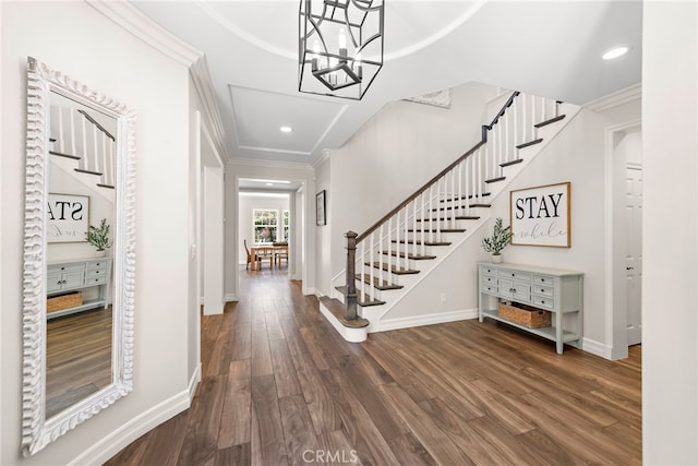 11 Markham Ln, Ladera Ranch, CA 92694 - entrance foyer featuring wood finished floors, stairway, crown molding, a chandelier, and recessed lighting