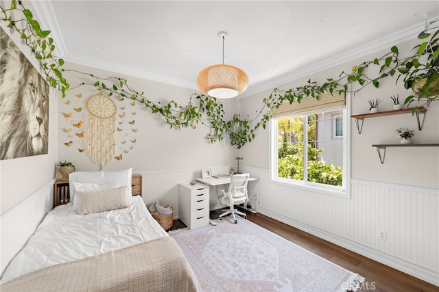 11 Markham Ln, Ladera Ranch, CA 92694 - bedroom with wainscoting, wood finished floors, a desk, and ornamental molding