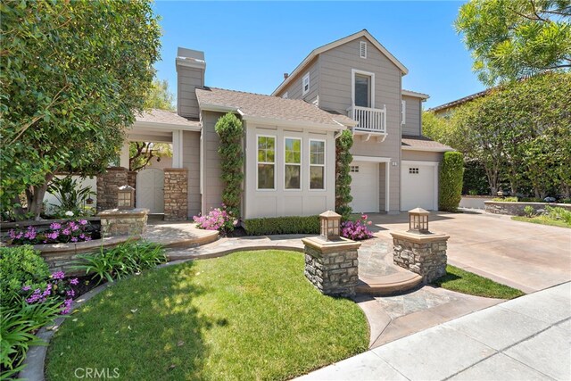 11 Markham Ln, Ladera Ranch, CA 92694 - traditional home featuring driveway, an attached garage, a shingled roof, and a chimney