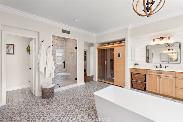 11 Markham Ln, Ladera Ranch, CA 92694 - bathroom featuring a chandelier, baseboards, a stall shower, ornamental molding, and vanity
