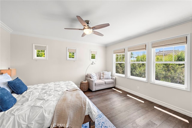 11 Markham Ln, Ladera Ranch, CA 92694 - bedroom with crown molding, dark wood-type flooring, baseboards, and a ceiling fan
