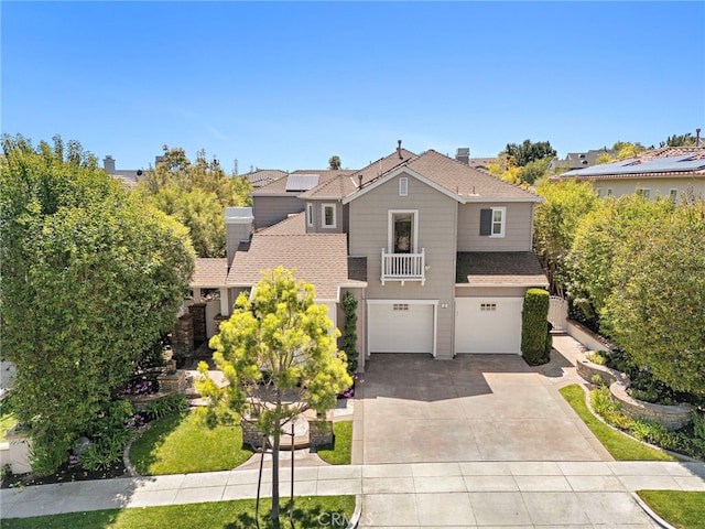 11 Markham Ln, Ladera Ranch, CA 92694 - view of front of house featuring driveway, an attached garage, and a shingled roof